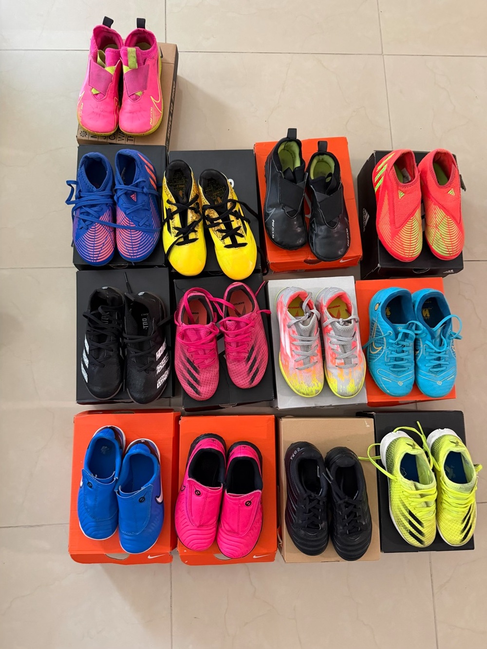 Various kids soccer cleats Nike and adidas